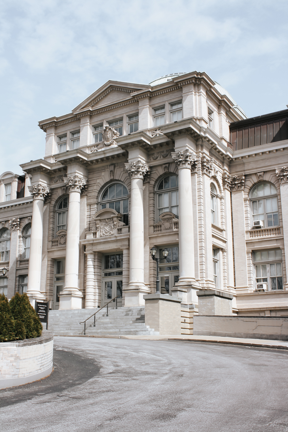 Beaux-Arts exterior facade of the New York Botanical Garden Bronx in early spring